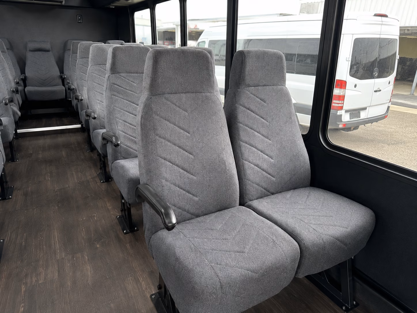 newark 15 passenger minibus inside